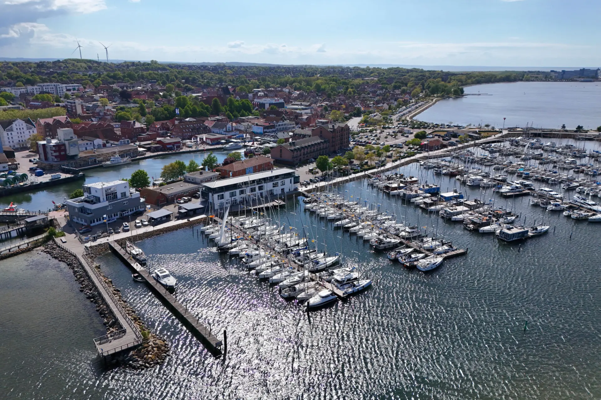 Marina Heiligenhafen combines the infrastructure of a major Baltic sailing base with the atmosphere of a seaside town, giving charter crews easy access to provisioning, restaurants and waterfront life before setting sail.